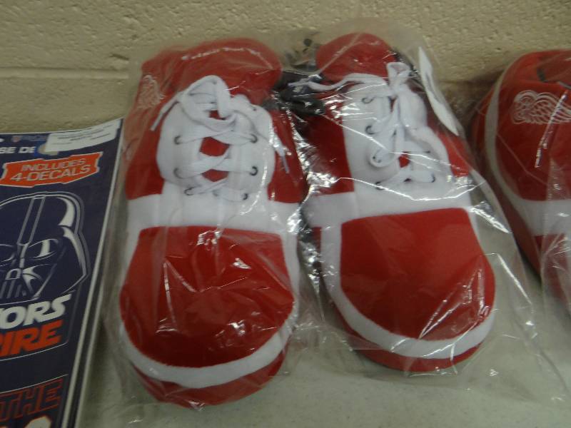 lot 656 image: Red wing slippers.