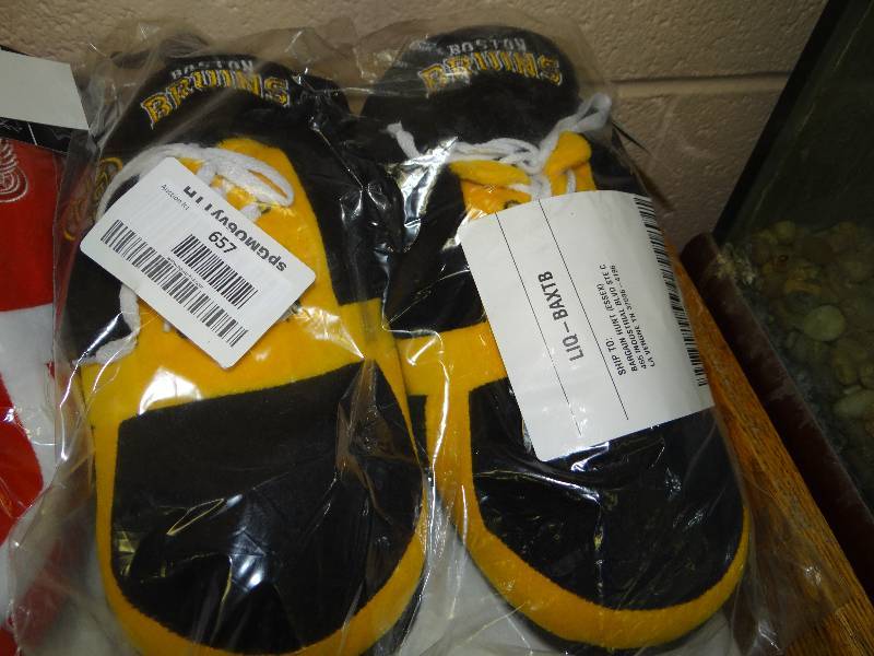 lot 657 image: Boston bruins slippers.