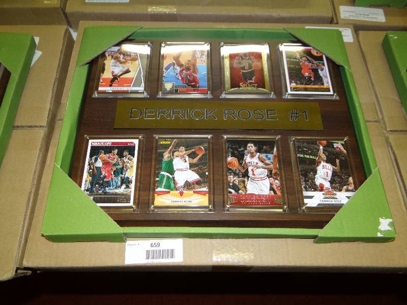 lot 659 image: #1 Derrick rose 8 card wall display.