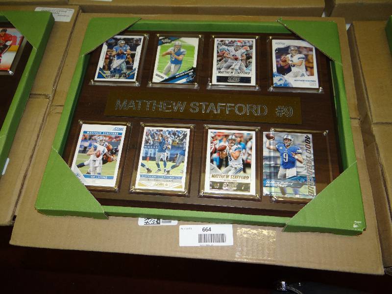 lot 664 image: #9 Mathew Stafford 8 car wall display.
