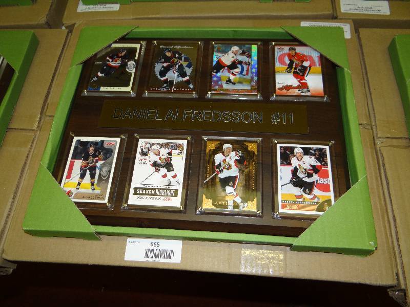 lot 665 image: #11 Daniel alfredsson 8 card wall display.
