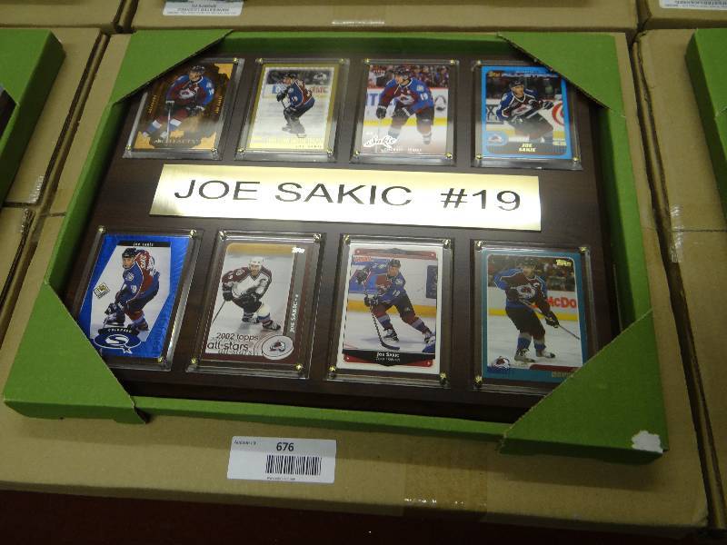 lot 676 image: #19 Joe Sakic 8 card wall display .
