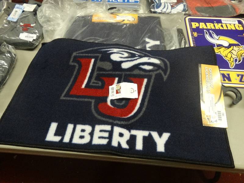 lot 700 image: Liberty University floor mat.