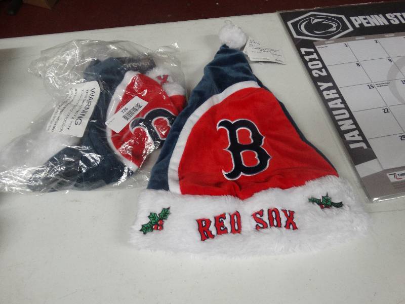 lot 726 image: 2 Boston Red Sox Santa hats.