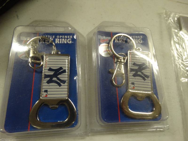 lot 731 image: 2 New York Yankees bottle openers.