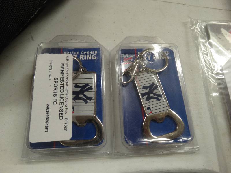 lot 732 image: 2 New York Yankees bottle openers.
