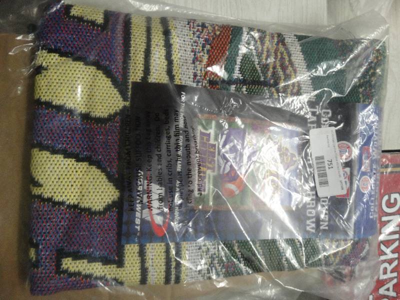 lot 751 image: NCAA Pirates 48 X 60 tapestry throw.