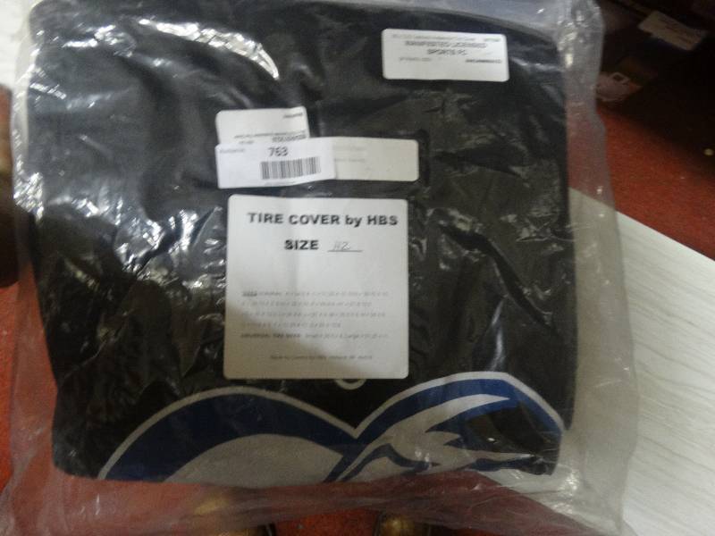 lot 763 image: Colorado avalanche tire cover.
