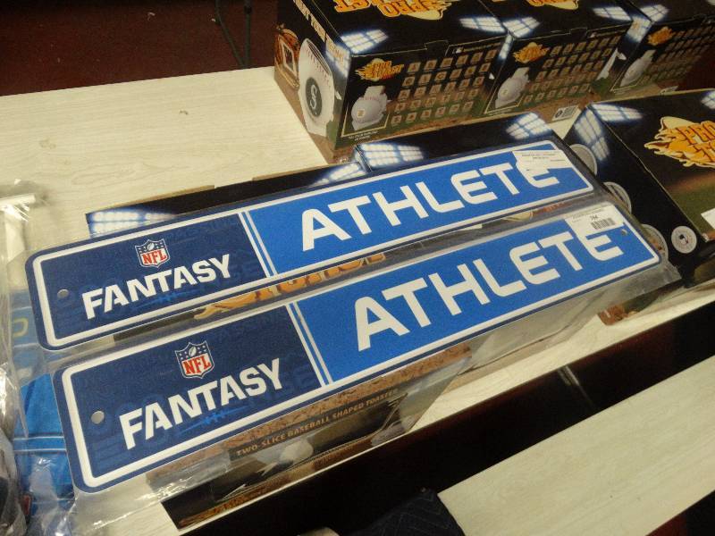 lot 765 image: 2 Fantasy athlete signs.