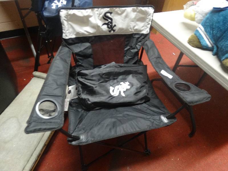 lot 767 image: White socks Folding camp chair wbag.