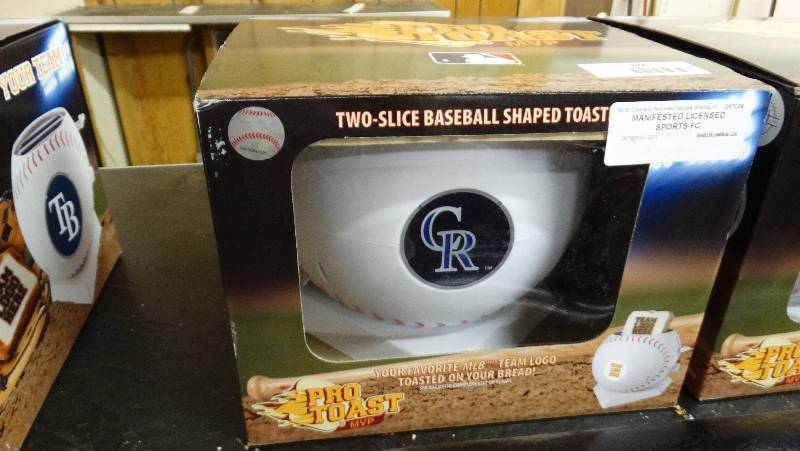 lot 774 image: Colorado Rockies two - slice baseball shaped toaster.