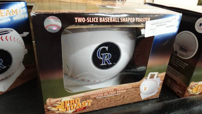 lot 775 image: Colorado Rockies two - slice baseball shaped toaster.