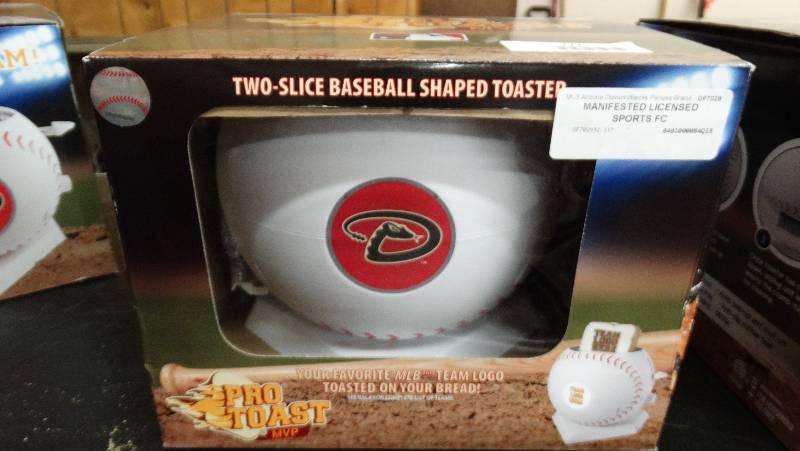 lot 777 image: Arizona diamond backs  two - slice baseball shaped toaster.