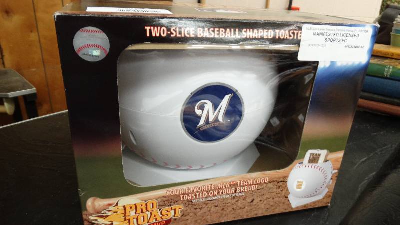 lot 781 image: Milwaukee Brewers  two - slice baseball shaped toaster.