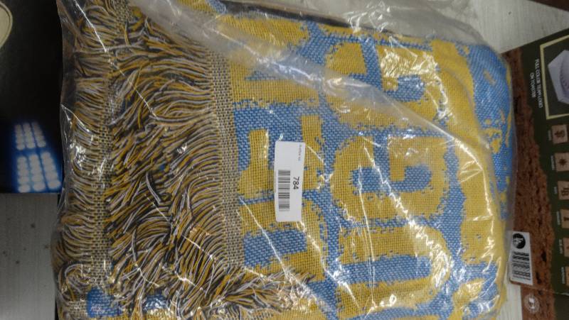 lot 784 image: Denver nuggets 48 X 60 blanket.