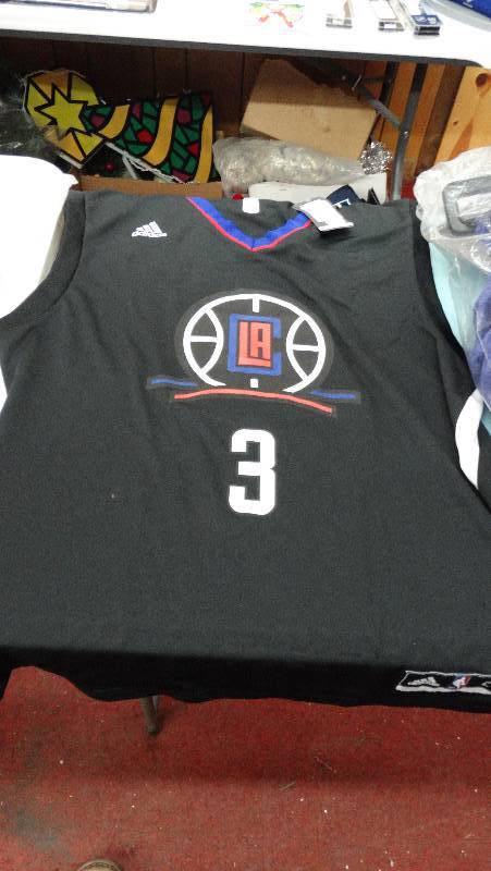 lot 792 image: New medium clippers replica jersey.