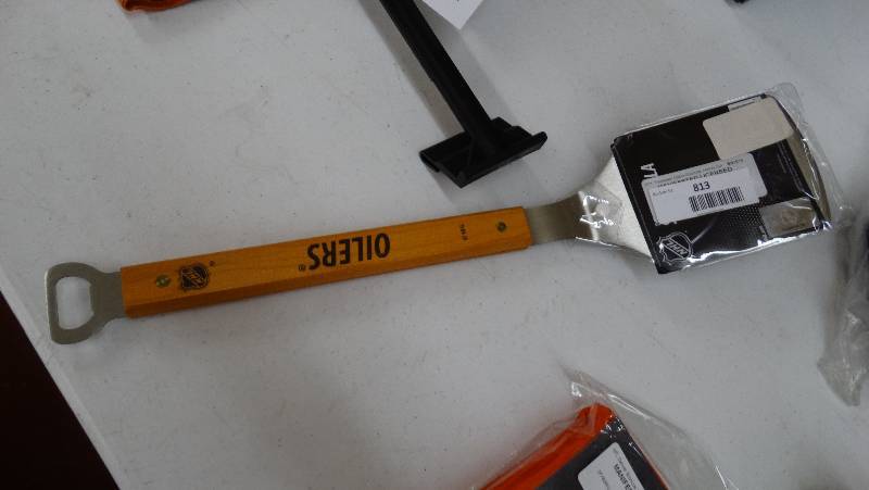 lot 813 image: Oilers grill spatula.