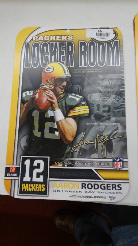 lot 822 image: Packers Aaron Rodgers plastic wall sign.