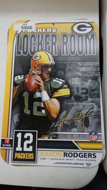 lot 823 image: Packers Aaron Rodgers plastic wall sign.