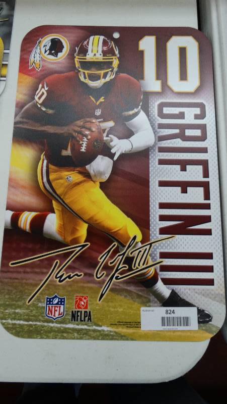 lot 824 image: RG3 Redskins plastic wall sign.