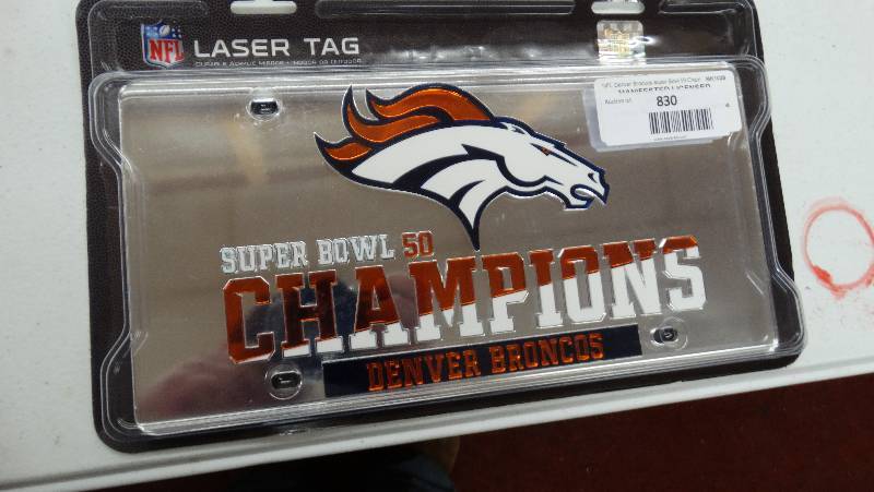 lot 830 image: Denver super bowl 50 license plate.