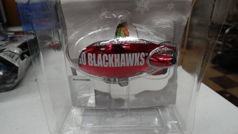 lot 845 image: Black hawks ornaments.