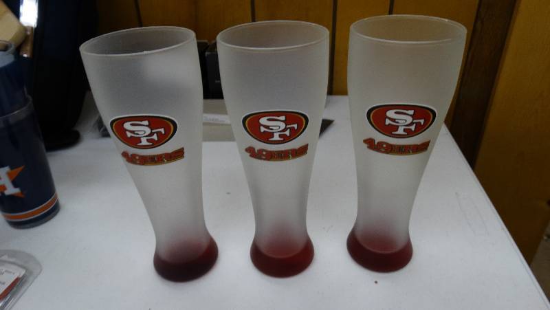 lot 849 image: 3 49ers pismire glasses.