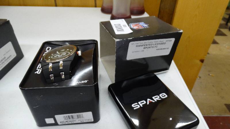 lot 855 image: New York Jets crusher watch.