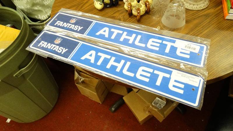 lot 879 image: 2 Fantasy Athlete wall sign.