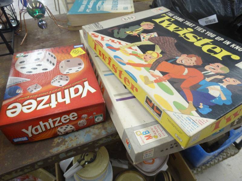 lot 1796 image: Twister, Yahtzee & life board games.