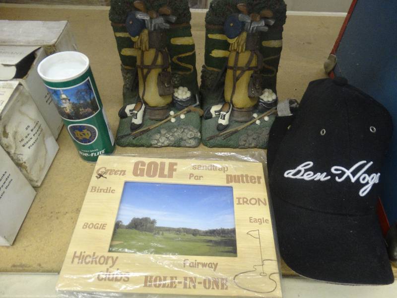 lot 1816 image: Golf decorated book ends, 3 golf balls, & Ben hogan hat.