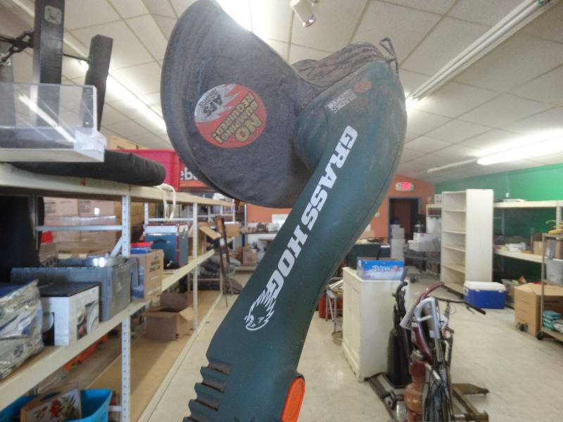 lot 1835 image: Black & Decker grass hog electric weed eater.