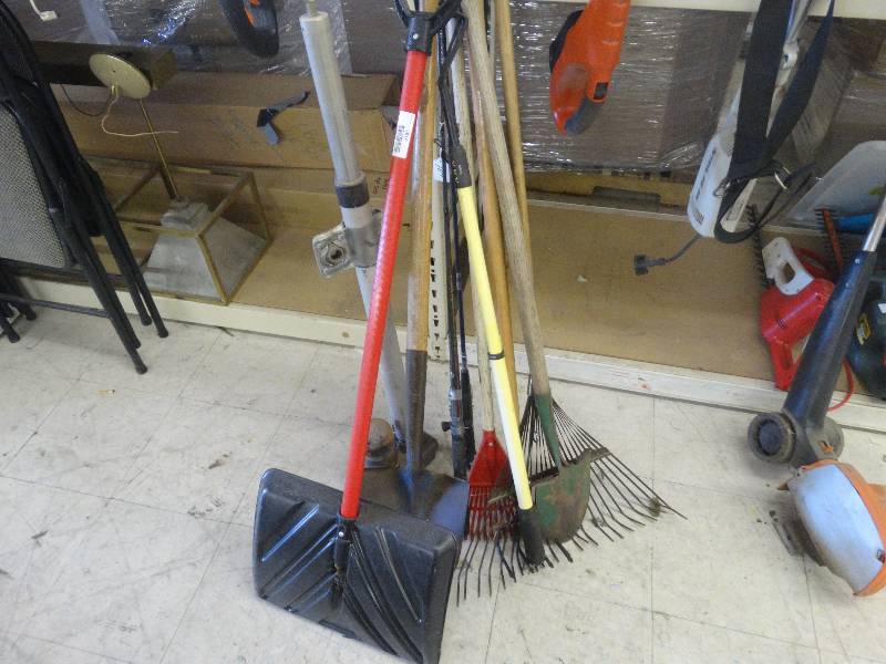 lot 1837 image: Lot of yard tools, snow shovel, fishing poles.