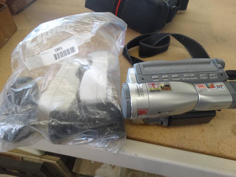 lot 1891 image: Canon camcorder wbattery charger.