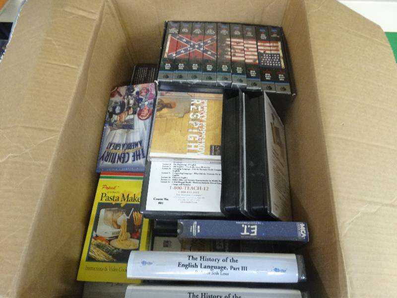 lot 1978 image: Box of VHS tapes.