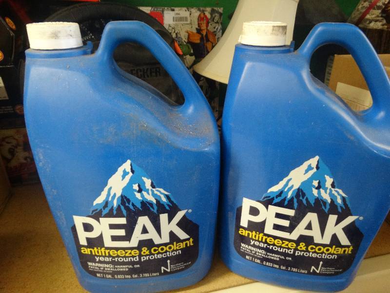 lot 1997 image: 2 Bottles of peak anit freeze & coolant .