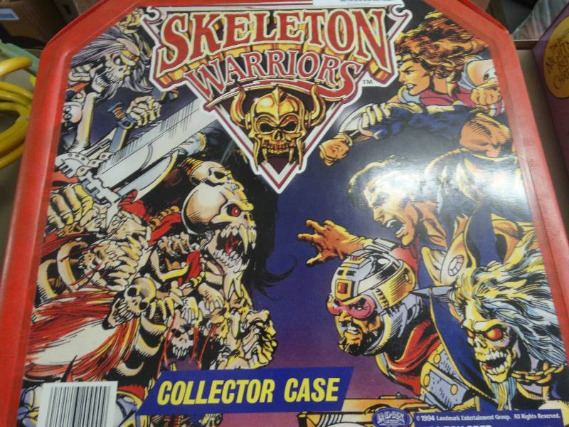 lot 1999 image: Skeleton warriors collection case.