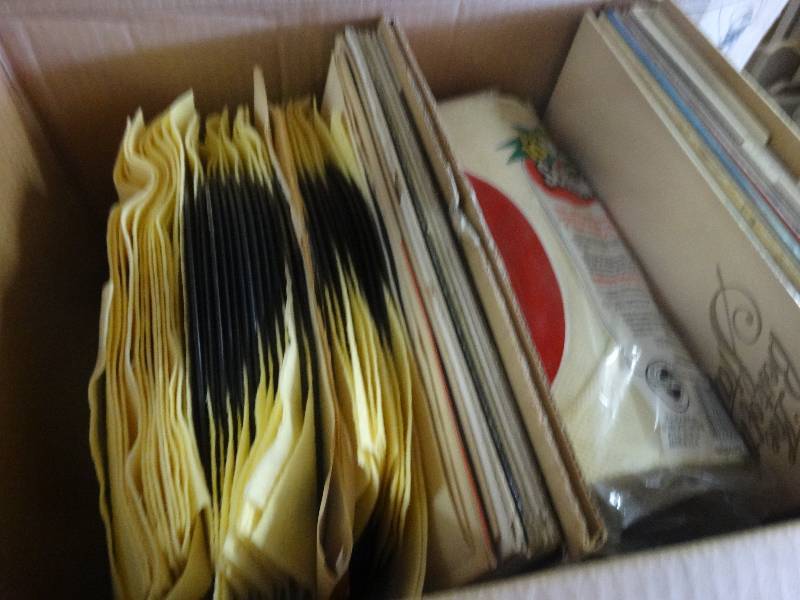 lot 2003 image: Box of old records.