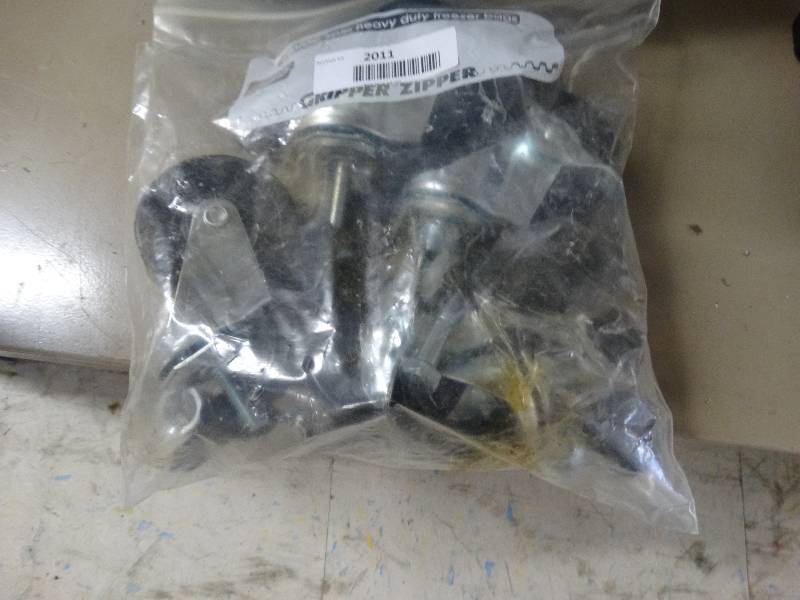 lot 2011 image: Lot of swivel wheels.