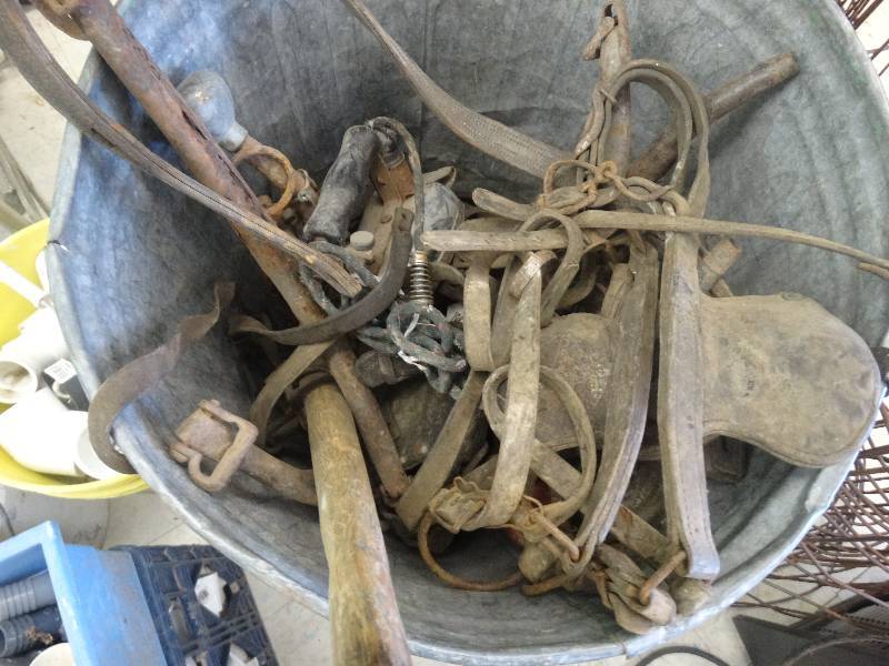 lot 2665 image: Trash can full of Strapshorse tack.