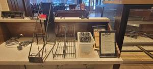 lot 10745 image: Lot of Metal Caddies, Metal Restaurant Sign Holders, and More