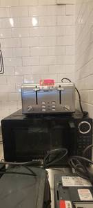 lot 10748 image: Proctor Silex Microwave and a Greek Chef Toaster