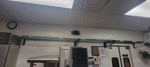lot 10779 image: 148in Wall-Mount Green Shelving