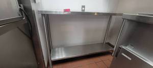 lot 10783 image: 53in 2-Tier Stainless Steel Table