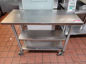 lot 10802 image: Commerical Stainless-steel Rolling Prep Table