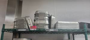 lot 10881 image: Lot of 18 Cinnamon Roll Pans and 10 Aluminum Half Sheet Pans