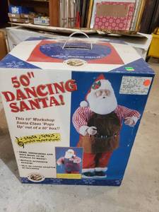 lot 2495 image: 50 dancing Santa in box