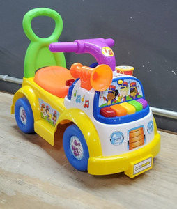 lot 56641 image: Little People Fisher-Price Music Parade Ride-On, White