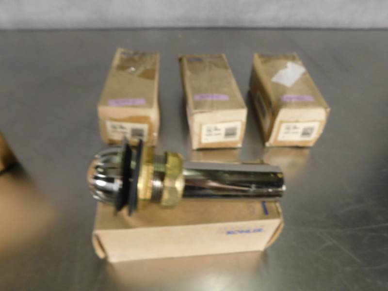 lot 3957 image: Lot of Kohler Beehive Urinal Strainers