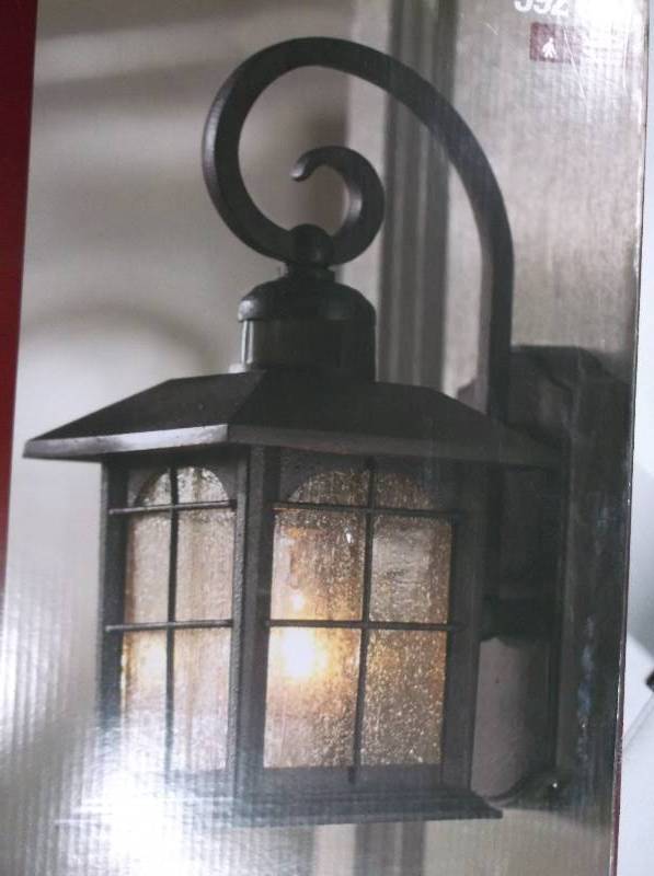 lot 8020 image: Home Decorators Motion Sensing Exterior Wall Lantern - Aged Iron Finish